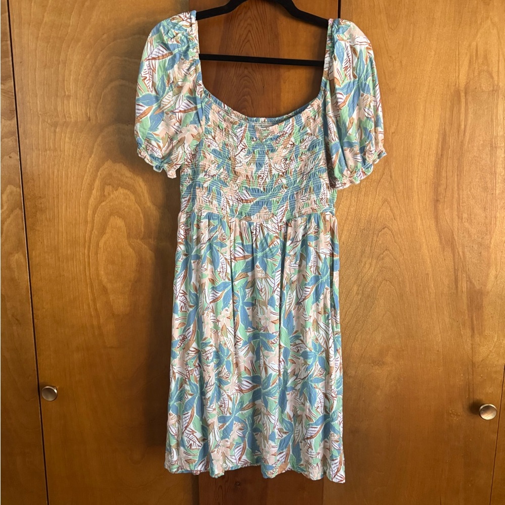 Perfect light summer dress. Also great as a swimsuit cover up. Barely worn.